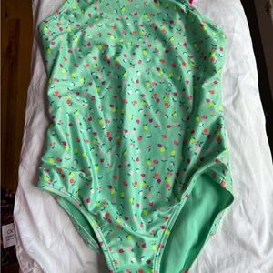 Two GAP girls bathing suits. Floral One Piece and Polkadot Surfer.